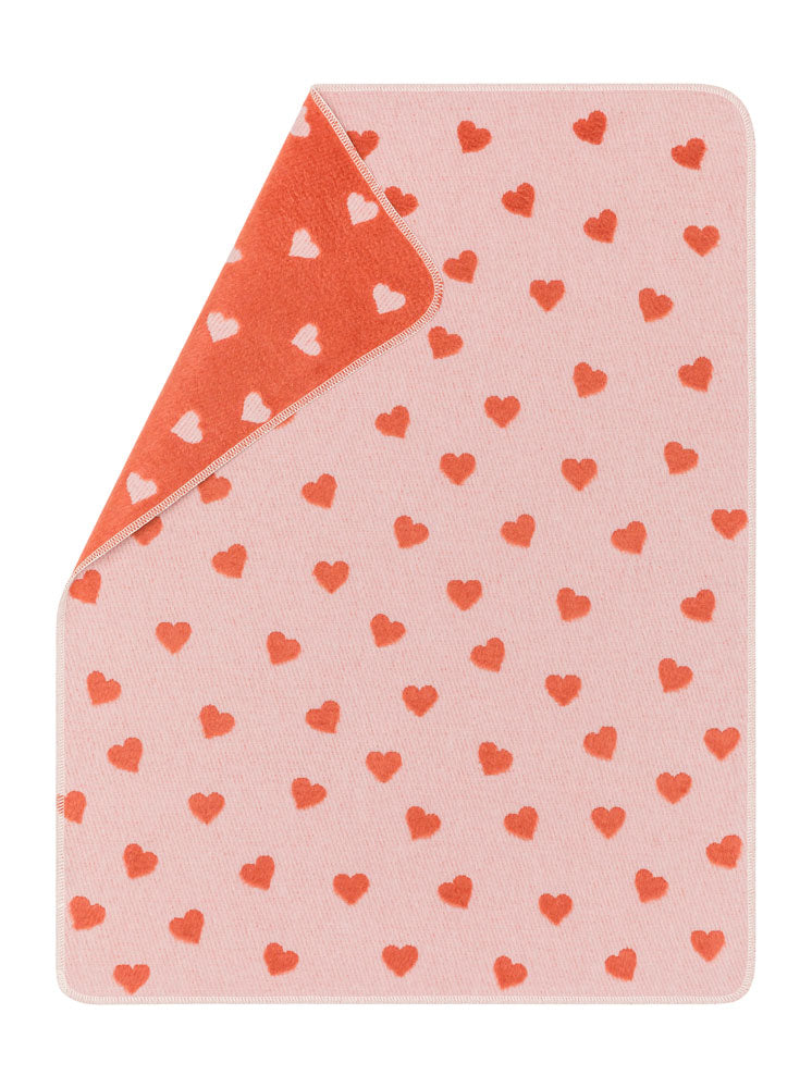 CARLA baby blanket "hearts allover" in rosé . Blanket made by David Fussenegger , a family-run mill in Austria.