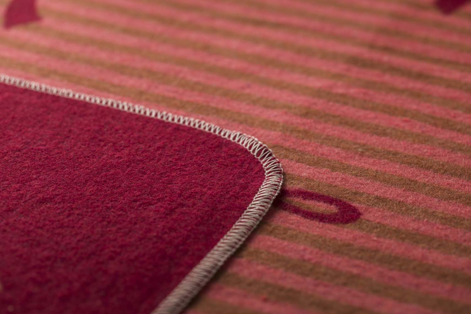 SILVRETTA throw "bows allover" in . Throw Blanket made by David Fussenegger , a family-run mill in Austria.