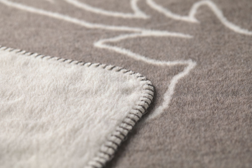 SAVONA throw "stag heads linear" in . Throw Blanket made by David Fussenegger , a family-run mill in Austria.