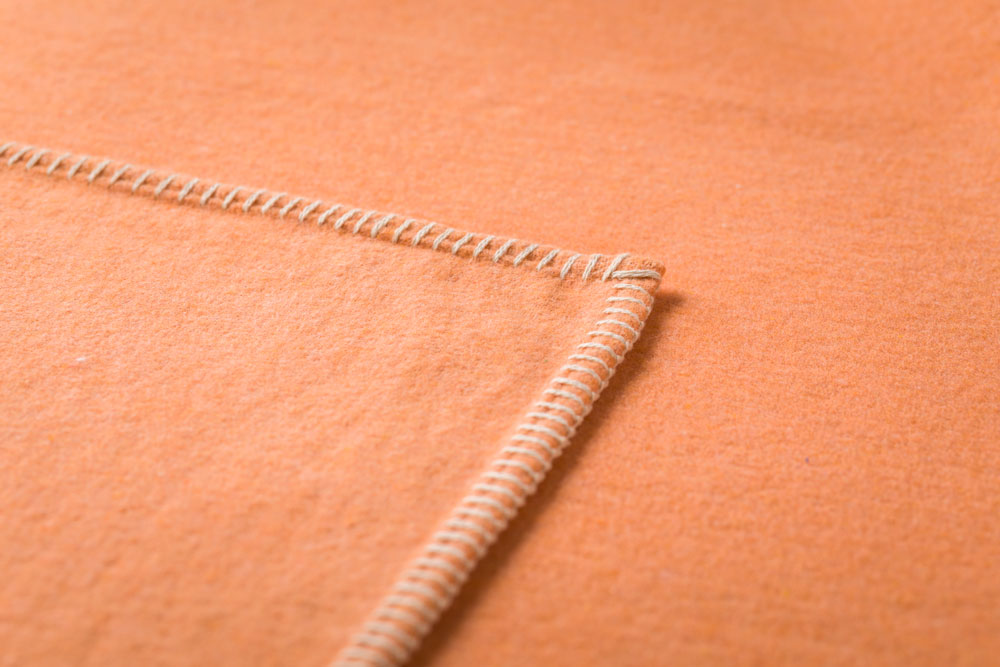 SYLT throw solid in . Throw Blanket made by David Fussenegger , a family-run mill in Austria.