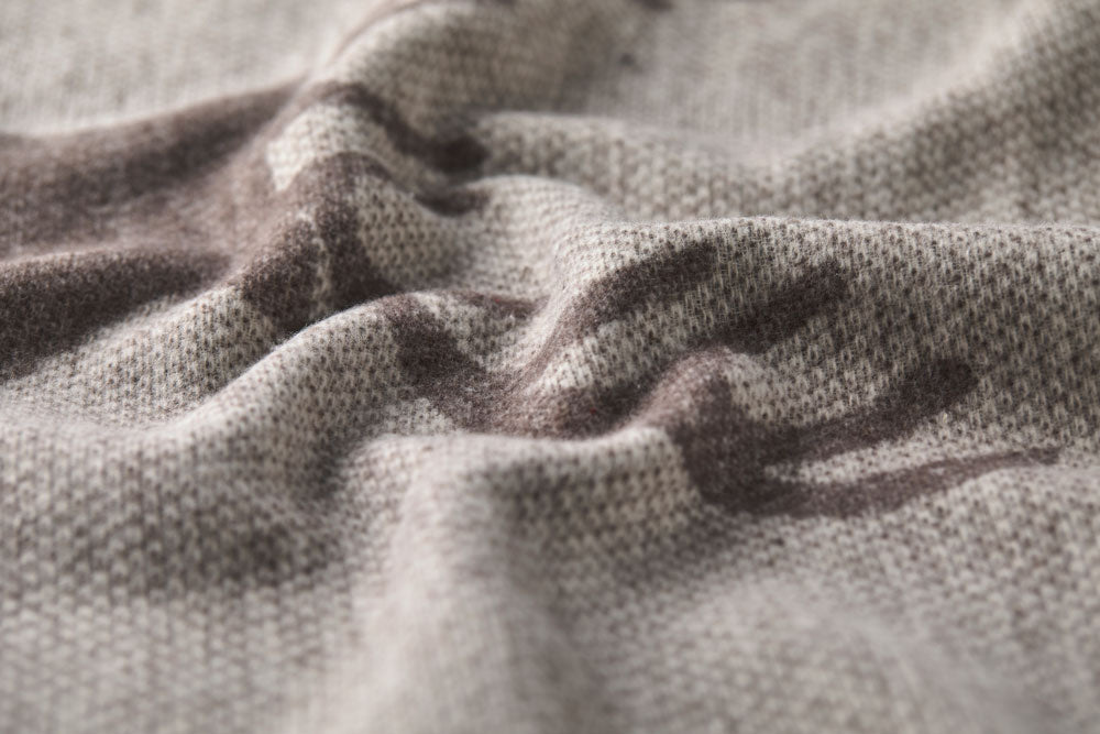 LUCA throw "centered deer" in . Throw Blanket made by David Fussenegger , a family-run mill in Austria.