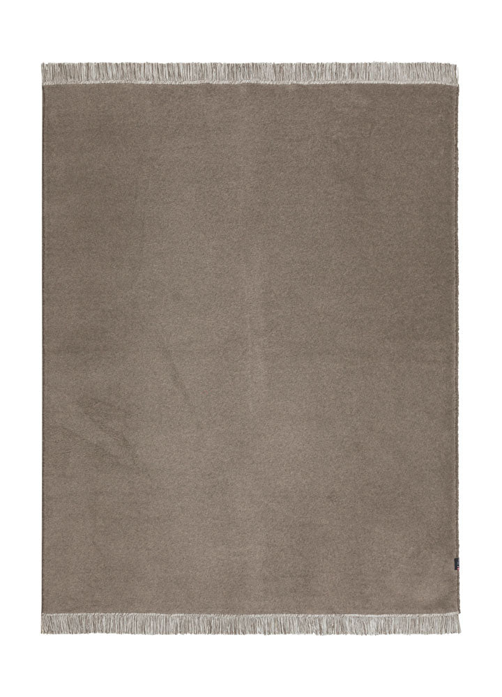 VIENNA throw solid with fringe in smoke . Throw Blanket made by David Fussenegger , a family-run mill in Austria.