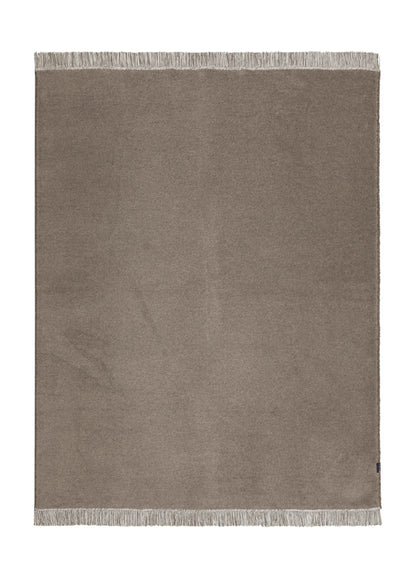 VIENNA throw solid with fringe in smoke . Throw Blanket made by David Fussenegger , a family-run mill in Austria.