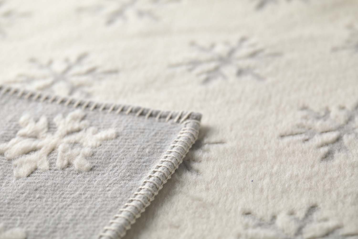 CARLA throw plaid "snowflake" in . Throw Blanket made by David Fussenegger , a family-run mill in Austria.