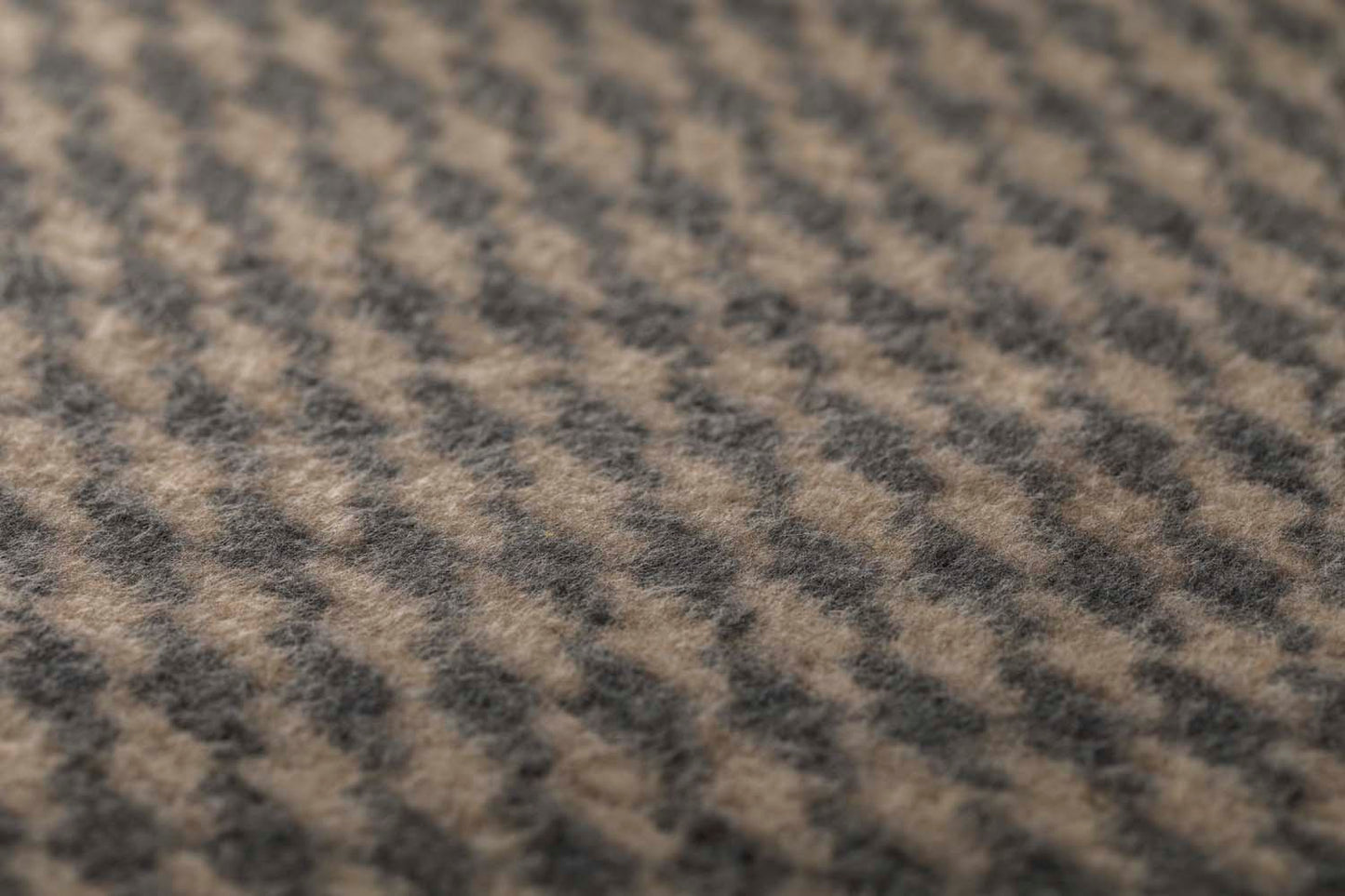 MERANO throw "houndstooth" in . made by INDIGO 11 , a family-run mill in Austria.