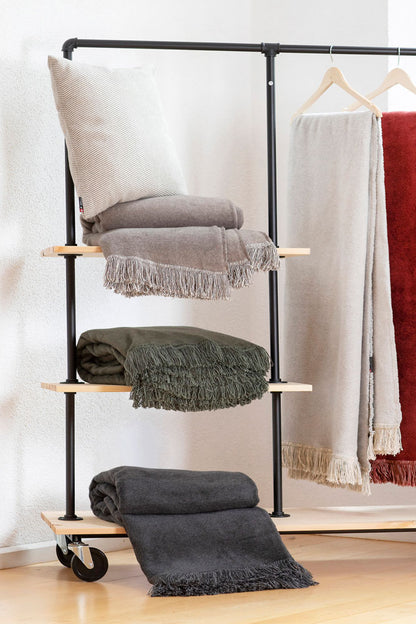 VIENNA throw solid with fringe in . Throw Blanket made by David Fussenegger , a family-run mill in Austria.