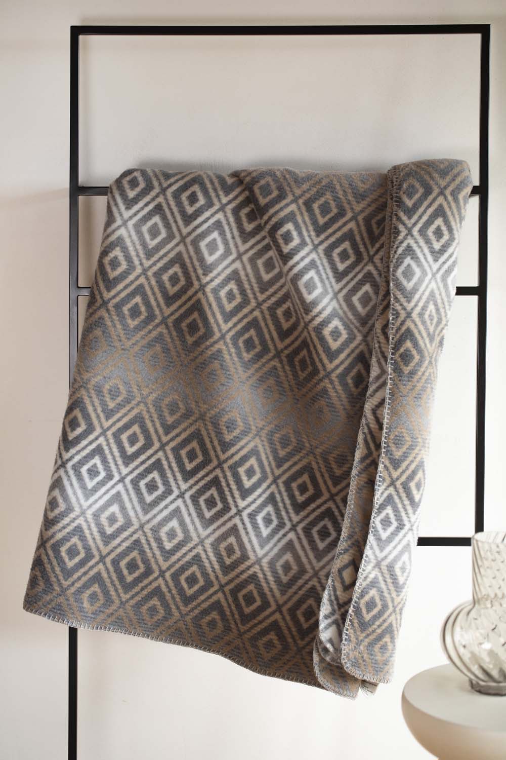 SAVONA throw "lozenge shapes gradient" in . Throw Blanket made by David Fussenegger , a family-run mill in Austria.