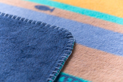 MILA baby blanket "school of fish" in . Blanket made by David Fussenegger , a family-run mill in Austria.