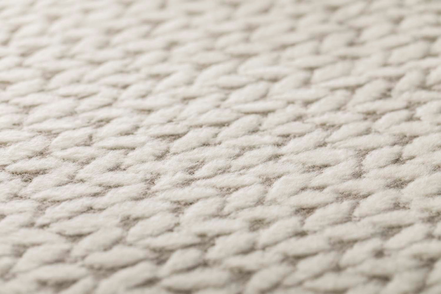 CARLA throw "knitted pattern" in . Throw Blanket made by David Fussenegger , a family-run mill in Austria.