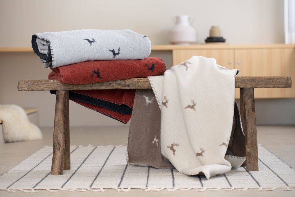 SAVONA throw "deer allover" in . Throw Blanket made by David Fussenegger , a family-run mill in Austria.