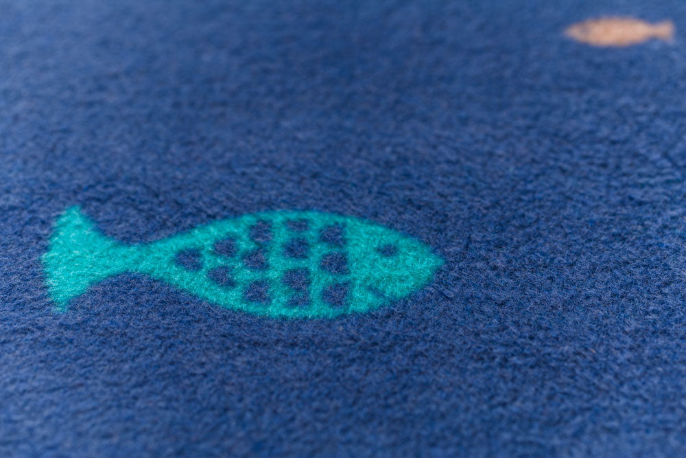 MILA baby blanket "school of fish" in . Blanket made by David Fussenegger , a family-run mill in Austria.