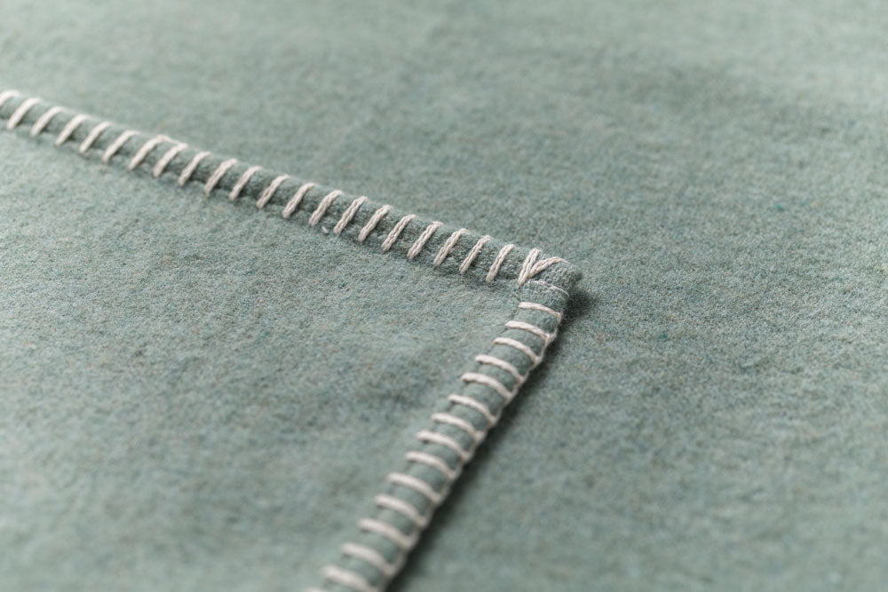 SYLT throw solid in . Throw Blanket made by David Fussenegger , a family-run mill in Austria.
