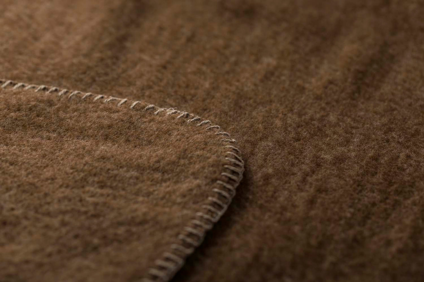 MERANO throw "faux solid"