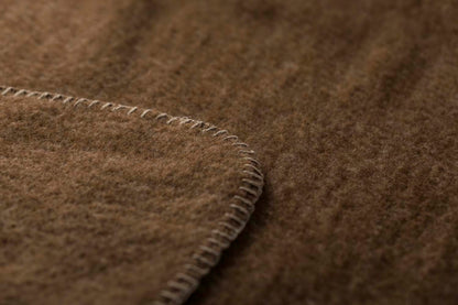 MERANO throw "faux solid"