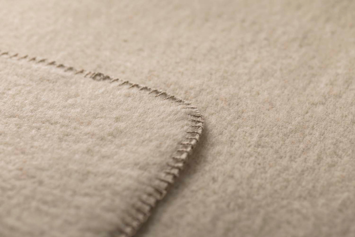 MERANO throw "faux solid"