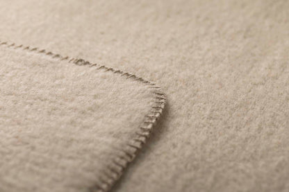 MERANO throw "faux solid"