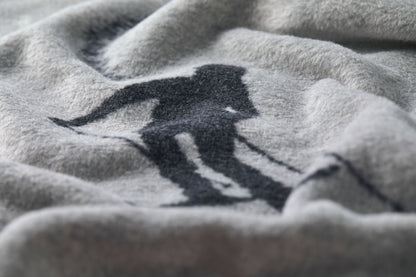 SAVONA throw "skiers leaving tracks" in . Throw Blanket made by David Fussenegger , a family-run mill in Austria.