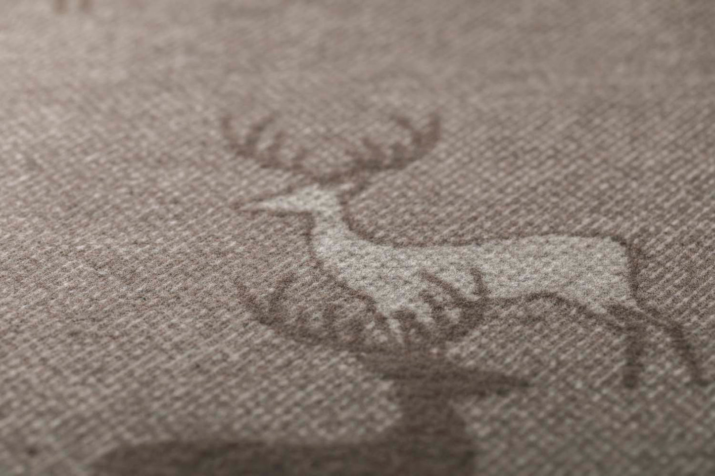 LUCA throw "pairs of stags" in . Throw Blanket made by David Fussenegger , a family-run mill in Austria.