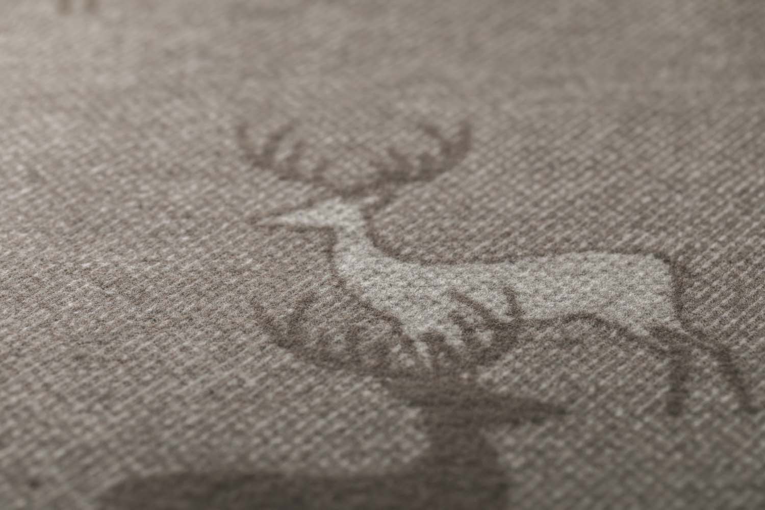 LUCA throw "pairs of stags" in . Throw Blanket made by David Fussenegger , a family-run mill in Austria.