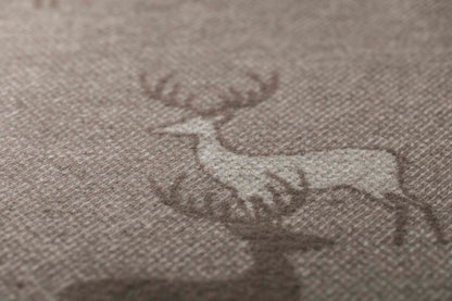 LUCA throw "pairs of stags" in . Throw Blanket made by David Fussenegger , a family-run mill in Austria.