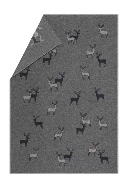 LUCA throw "pairs of stags" in charcoal . Throw Blanket made by David Fussenegger , a family-run mill in Austria.