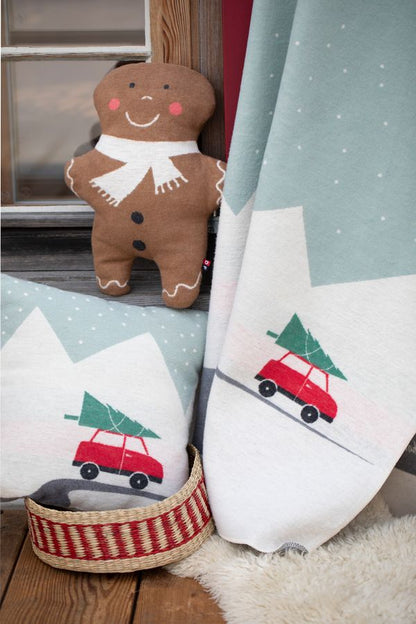 JUWEL Pillow "Gingerbread Man" in . Filled Cushion made by David Fussenegger , a family-run mill in Austria.