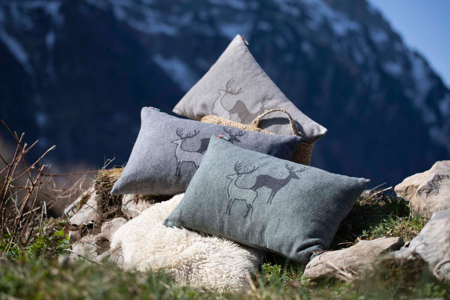 SILVRETTA cushion cover "pair of stags" in . Cushion Cover made by David Fussenegger , a family-run mill in Austria.