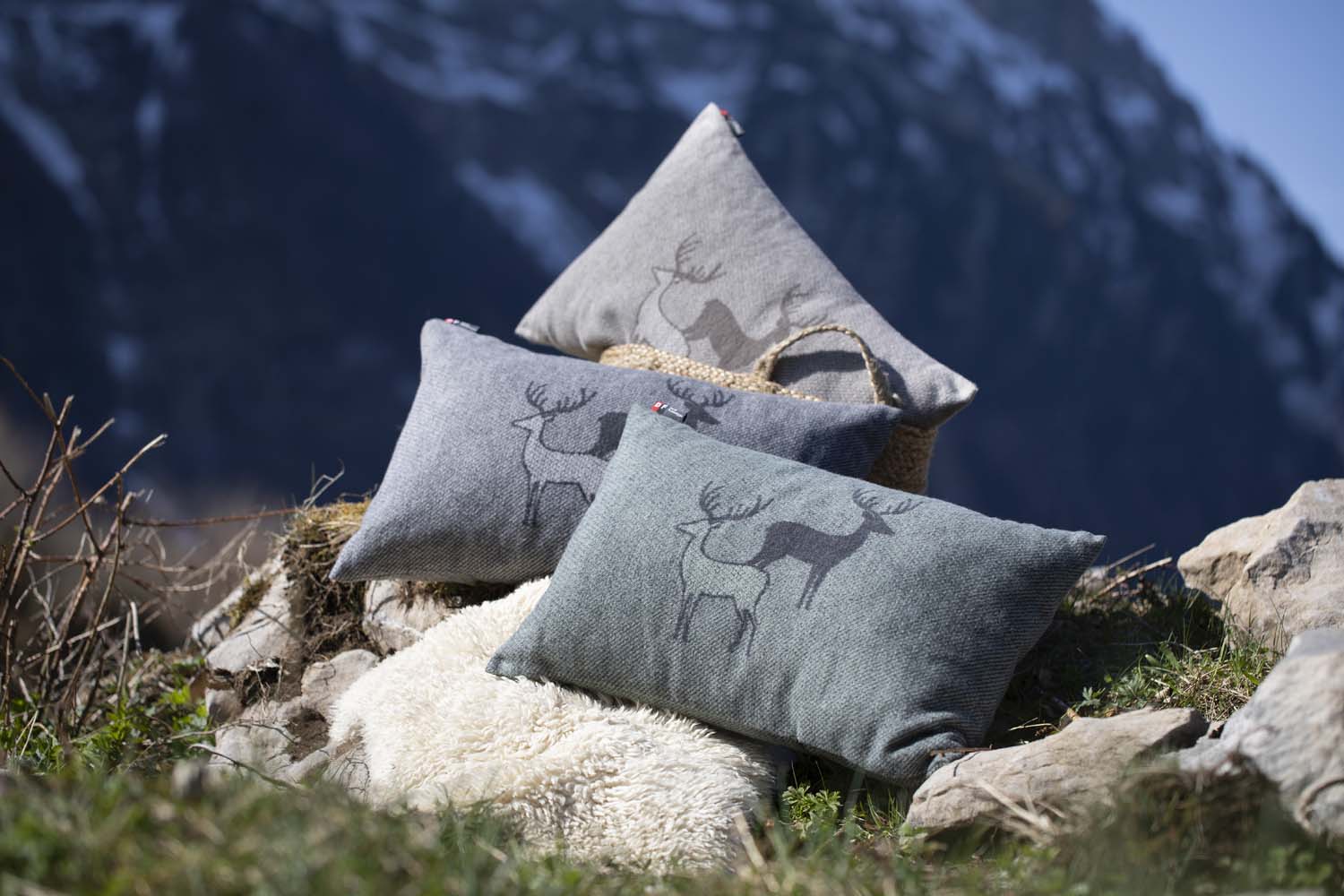 SILVRETTA cushion cover "pair of stags" in . Cushion Cover made by David Fussenegger , a family-run mill in Austria.