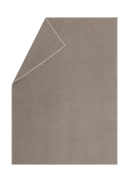 SYLT throw solid in mud . Throw Blanket made by David Fussenegger , a family-run mill in Austria.