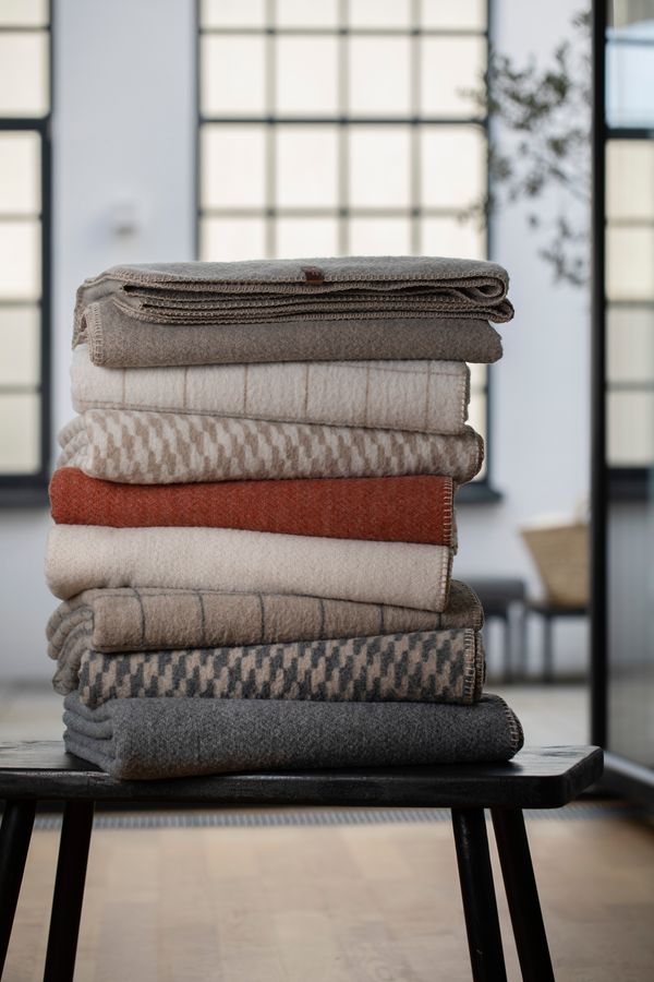 MERANO Throw "Solid" in . Throw Blanket made by David Fussenegger , a family-run mill in Austria.