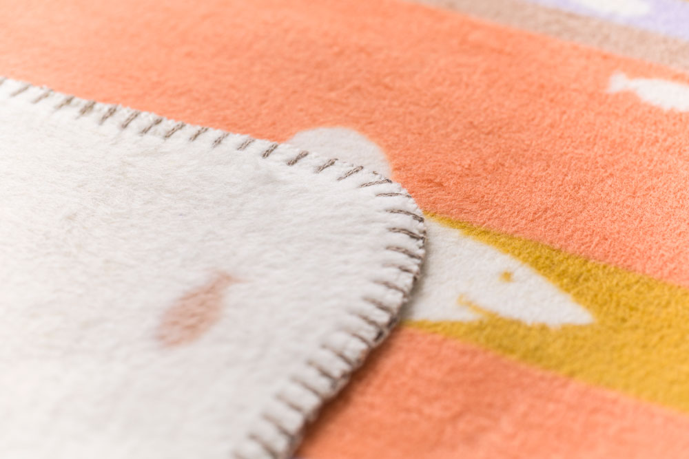 MILA baby blanket "school of fish" in . Blanket made by David Fussenegger , a family-run mill in Austria.