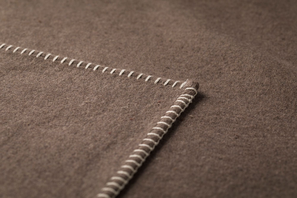 SYLT throw solid in . Throw Blanket made by David Fussenegger , a family-run mill in Austria.