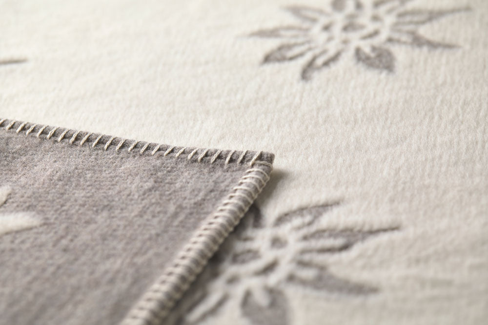 CARLA throw "Edelweiß" in . Throw Blanket made by David Fussenegger , a family-run mill in Austria.