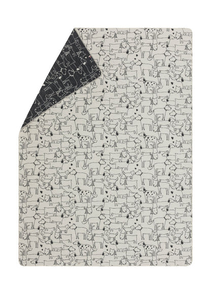 JUWEL throw "dogs allover" in offwhite . Blanket made by David Fussenegger , a family-run mill in Austria.