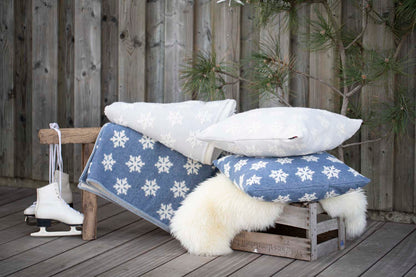 CARLA throw plaid "snowflake" in blue . Throw Blanket made by David Fussenegger , a family-run mill in Austria.