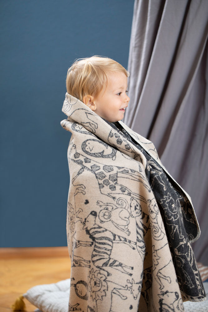 JUWEL toddler blanket "safari animals" in . Blanket made by David Fussenegger , a family-run mill in Austria.