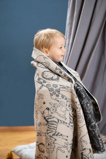 JUWEL toddler blanket "safari animals" in . Blanket made by David Fussenegger , a family-run mill in Austria.